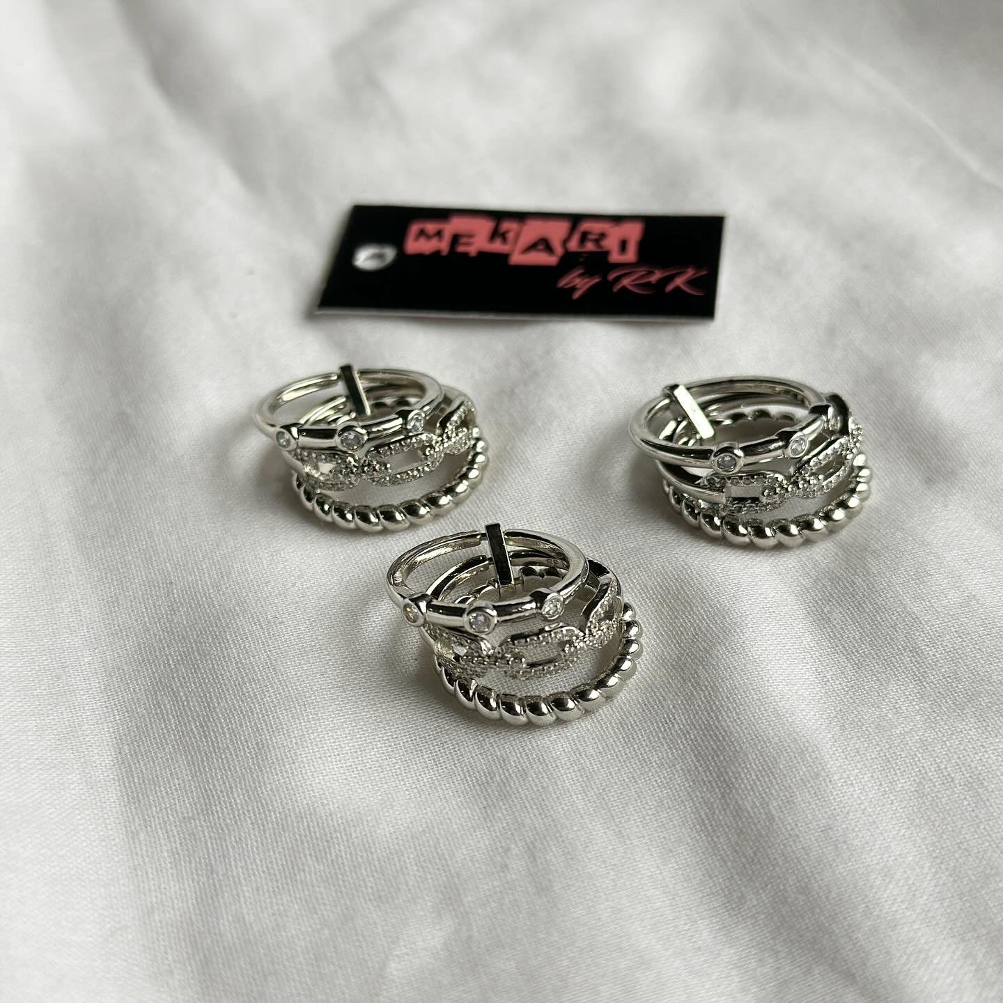 Linked Zircon Finger Band