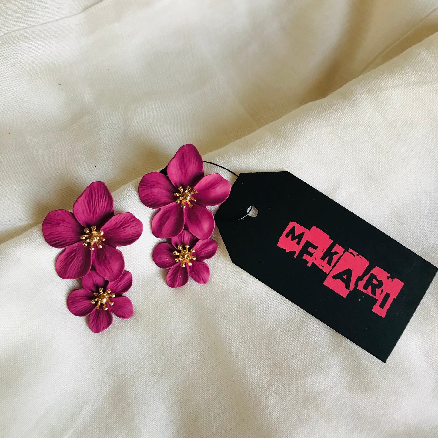 DUAL FLOWER STUD