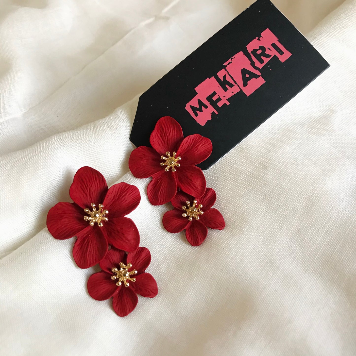 DUAL FLOWER STUD