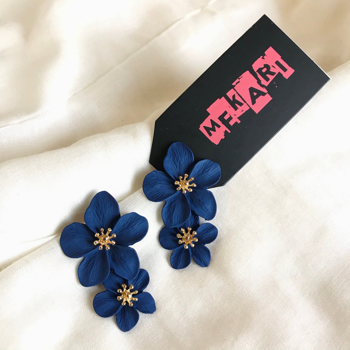 DUAL FLOWER STUD