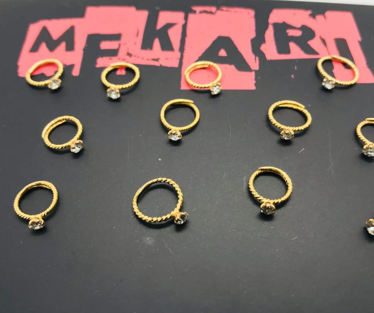 Single Stone Nosering Pair